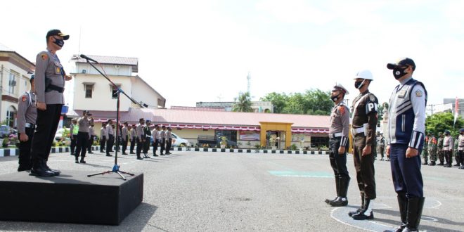 Kapolres Lhokseumawe AKBP Eko Hartanto, S.IK, MH Pimpin Apel Gelar Pasukan Operasi Patuh Seulawah-2020 di Mapolres Lhokseumawe, kamis (23/07/2020) sore.